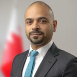 A small image of H.E. Osama bin Saleh Al-Alawi